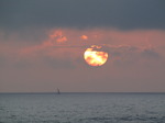 SX07463 Sailboat on horizon at sunset.jpg